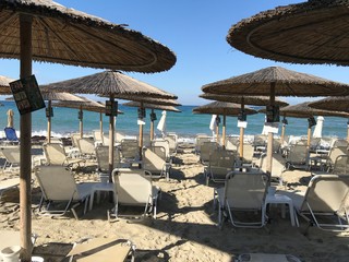 beach chairs and umbrella