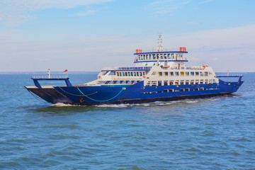 Fototapeta premium Sea freight ferry moves along the sea