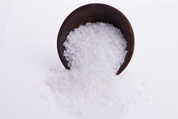 Fototapeta na wymiar Salt in spoon with white background