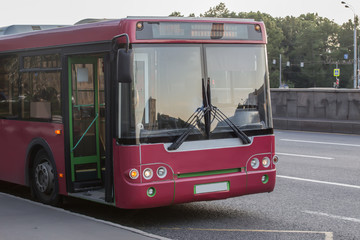 bus at the bus stop in the city center