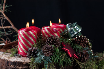 Advent candles on a black background