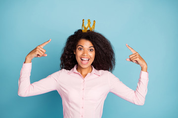 Photo of amazing dark skin curly model lady prom queen indicating fingers on tiara headwear...