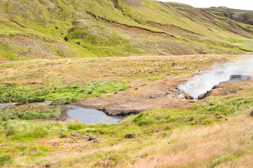 Fototapeta na wymiar Hot Spring Hiking and Natural Bathing in Geothermal Hot River Reykjadulur, Iceland, Europe.