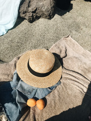 Fototapeta na wymiar straw hat on the beach