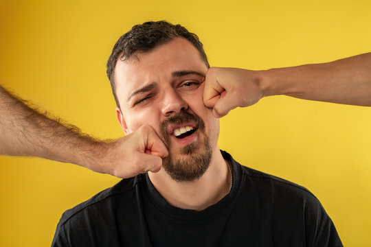 Young Man Being Punched In The Face