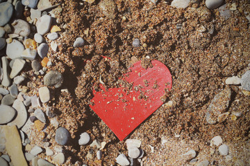paper bright heart buried in the ground