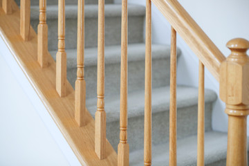 wooden stairs. Stair handrail closeup. - Image