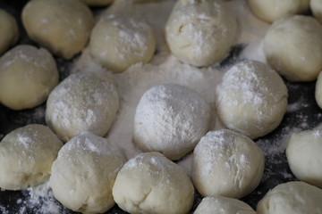 Fototapeta na wymiar balls of raw dough, preparation for baking