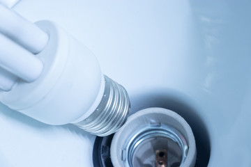 A white fluorescent lamp in a reading lamp