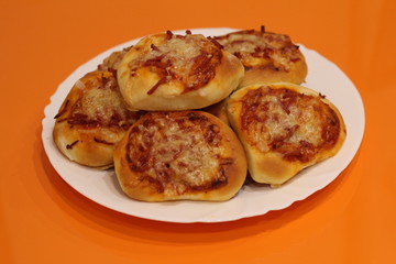 homemade pizza on orange background