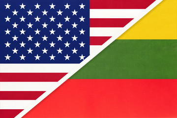 USA vs Lithuania national flag from textile. Relationship between american and european countries.