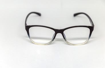 Glasses placed on a white surface