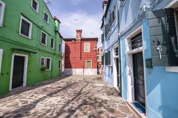 Fototapeta na wymiar Colourful homes of Burano, Italy. Little town near Venice