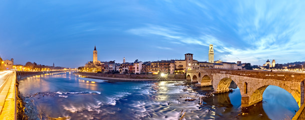 Fototapeta na wymiar The Pietra Bridge, the Basilica of Santa Anastasia and the river Adige in the city center of Verona. Veneto, Italy, Europe.