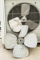 a broken ventilation fan of a compressor of a heavy duty air conditioner system  