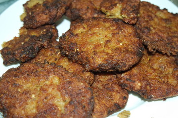 Delicious spicy fried round kebab served in white ceramic plate