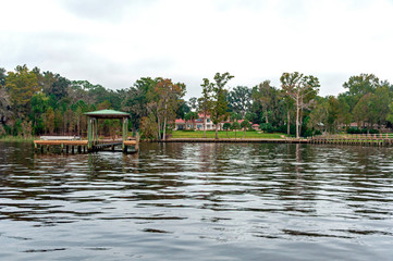 Beautiful Floridian houses with wooden docks on the river. Jacksonville, Florida, USA