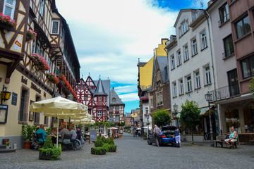 Fototapeta premium human activity in a small typical old village in germany in a summer day