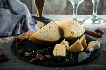Cheese with nuts on the table, delicious snack