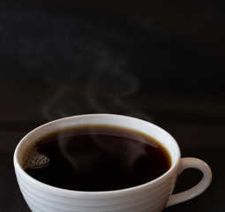 Close up black coffee in white cup