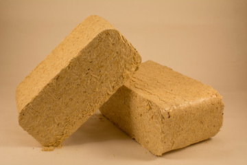 Two wood briquettes for the fireplace