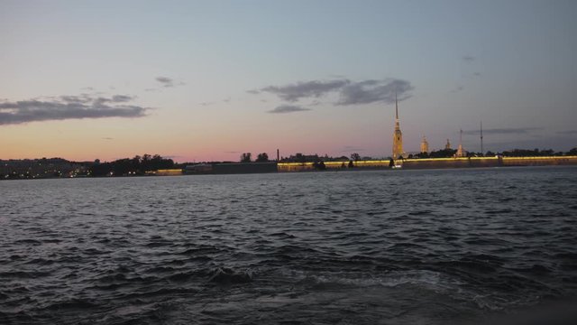 Saint Petersburg. Holiday Scarlet Sails. Russia. Sailboat sailing on the Neva River. Rasvet the sun on the background of the Peter and Paul Fortress. Holidays in the Russian Federation