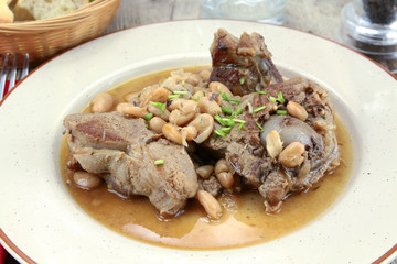fried lamb and white beans