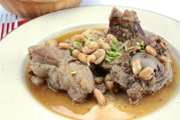 fried lamb and white beans