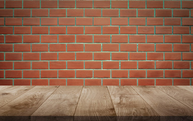 Orange brick wall texture and wooden floor background. wood on table background brick wall.used for display or montage products.