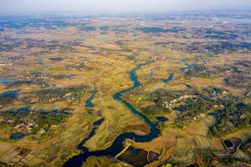 Aerial view of agricultural fields and river in china