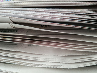 Pile of newspapers, detail of the pages.