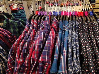 Multicolored man's shirts on Showcase in the boutique