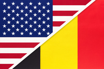 USA vs Belgium national flag from textile. Relationship between american and european countries.