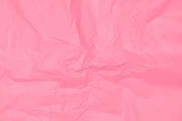 Crumpled pink paper texture, pink background, wallpaper
