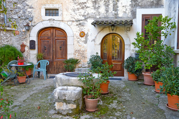 Fototapeta na wymiar A small square in an old town of Frosinone province, Italy.