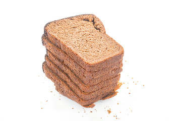 Sliced of rye bread close up on white background