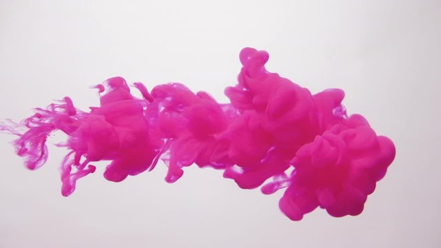 Ink cloud overlay. Fantasy whiff. Magenta pink smoke motion on white background for video editing.