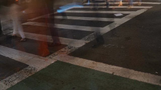 Crosswalk timelapse shot in Diagonal perspective showing pedestrian crowd traffic, shot in New York City Downtown
