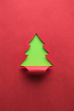 Christmas tree made of paper minimal creative winter holidays concept.