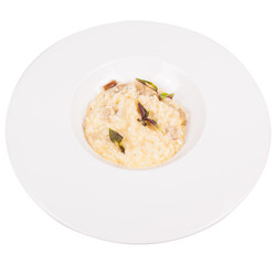 Rice with mushrooms on white plate isolated.