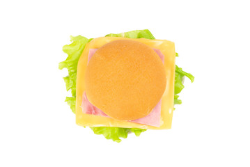 Sandwich with ham, cheese, lettuce on white background.
