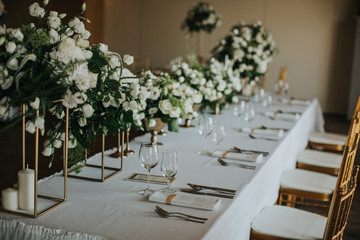 Wedding banquet tables with flowers decoration