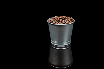 Coffee beans in metal cup