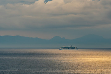 Distant view of touristic ship in the mediterranean sea. Travel.