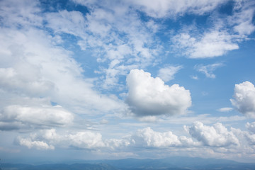 Perfect moment of the azure sky on a sunny day with clouds.