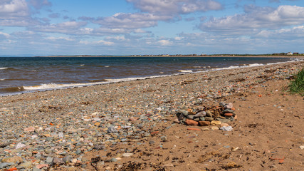A beach with a fireplace, seen near Allonby, Cumbria, England, UK