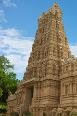 Fototapeta premium Hindu temple near Kuala Lumpar, Malaysia in Asia set against a vivid blue sky 