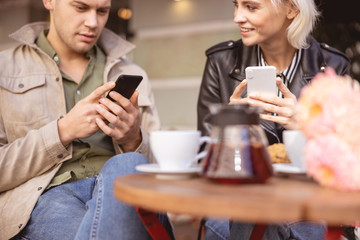 Couple spending their time in the cafe