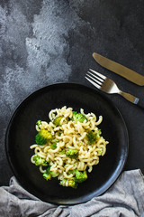 pasta broccoli, vegetarian dish (main course with vegetables Cavatappi, Elbow) menu concept. food background. top view. copy space