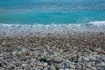 rocky beach and waves of the sea
